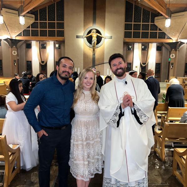 White lace dress with floral embroidery in Catholic conversion story