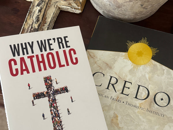 White hardcover Why We’re Catholic book by Trent Horn with cross silhouettes