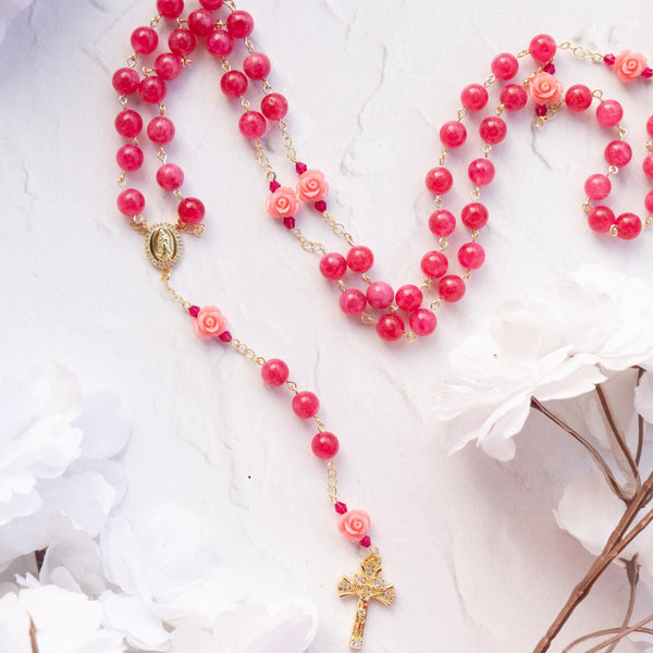The Little Flower Rosary: pink coral beads with gold accents and cross
