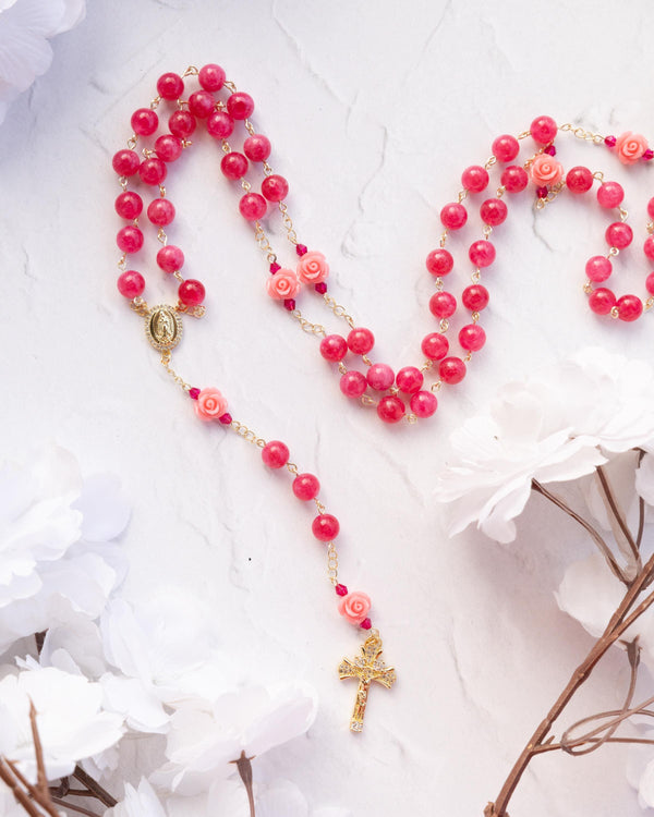 The Little Flower Rosary: pink coral beads with gold accents and cross