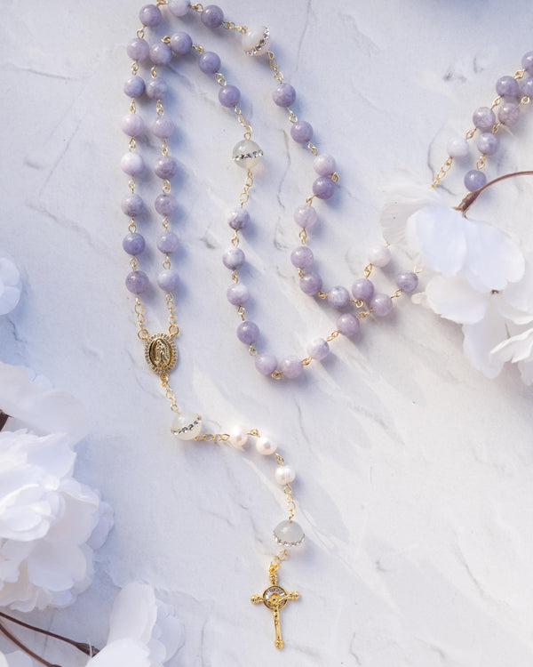 Lenten lavender rosary with white beads, gold accents, medallion, cross