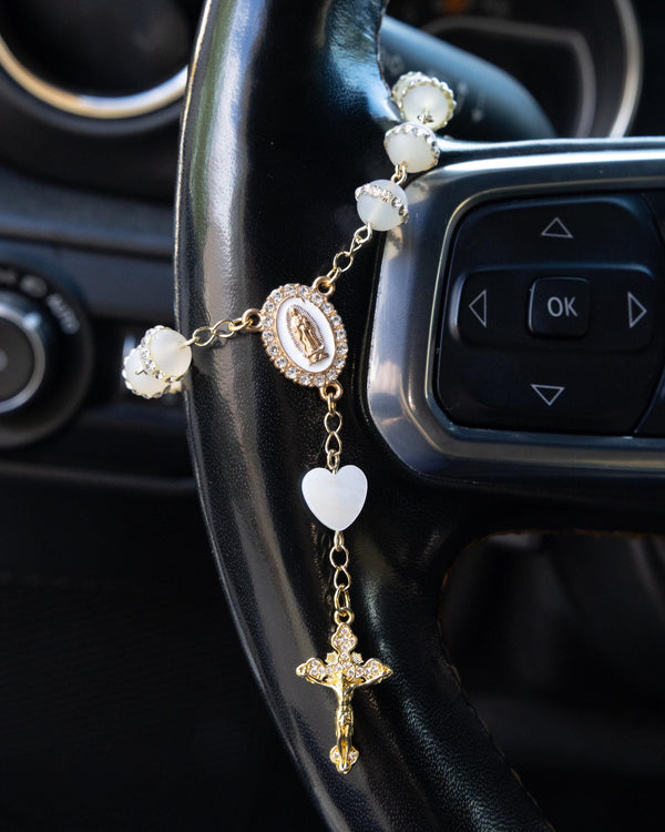 Delicate gold rosary charm with jade beads, rhinestone medallion, heart and crucifix pendants