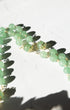 Jadeite Rosary: Delicate green jade beads with gold floral connectors