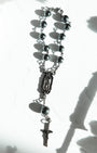 Silver-toned Armor of God car rosary with spherical beads and crucifix