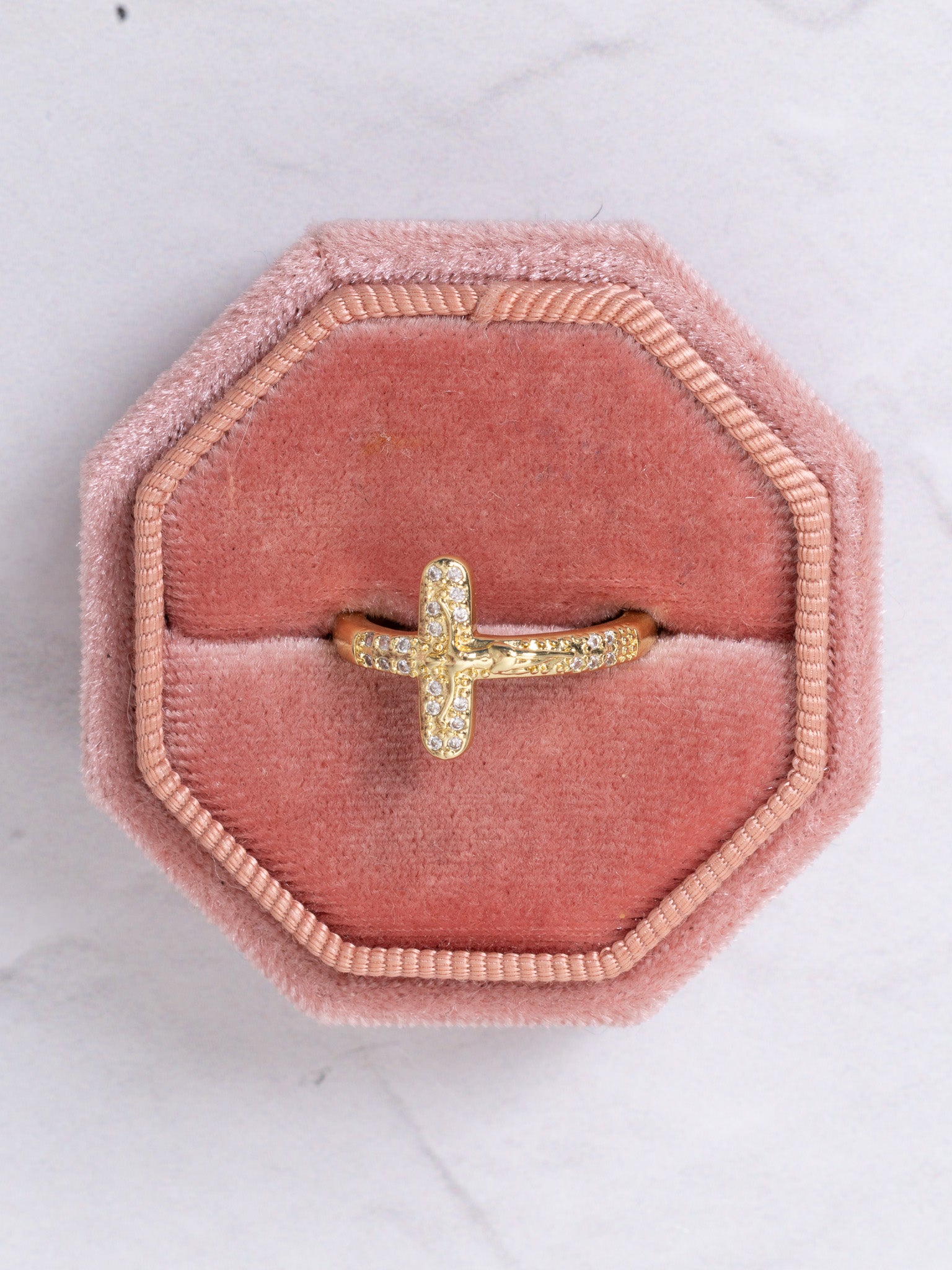 Elegant gold crucifix ring with pave-set diamonds