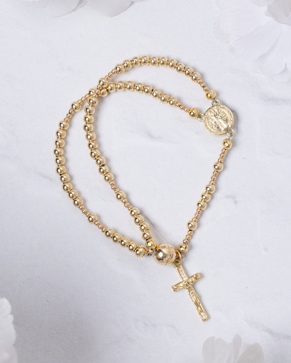 14K gold magnetic rosary bracelet with beaded design, medallion, and cross pendant