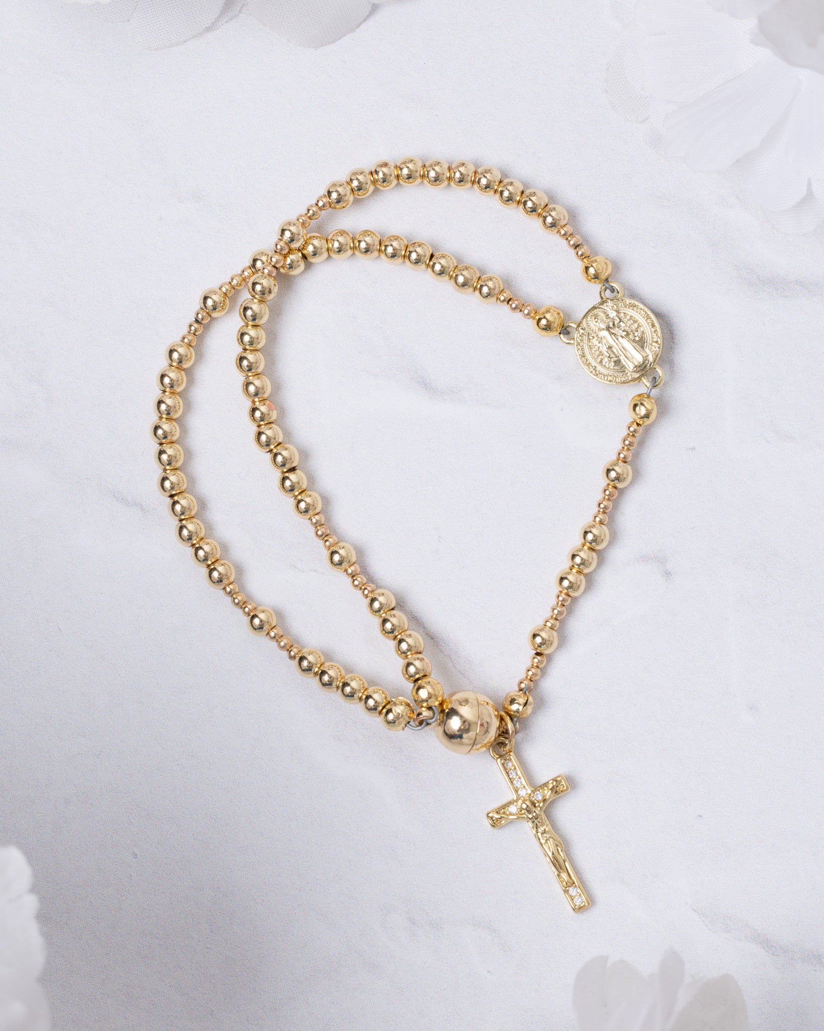 14K gold magnetic rosary bracelet with beaded design, medallion, and cross pendant