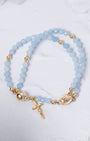 Stella Maris light blue beaded magnetic rosary bracelet with gold accents, cross charm, oval medallion