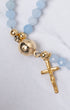 Stella Maris light blue beaded magnetic rosary bracelet with gold crucifix