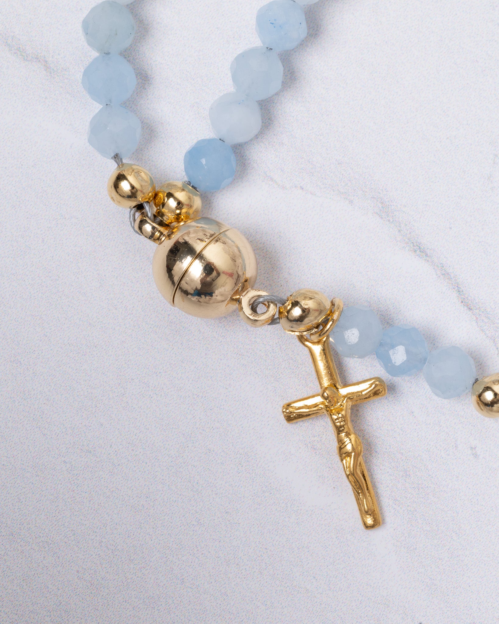Stella Maris light blue beaded magnetic rosary bracelet with gold crucifix