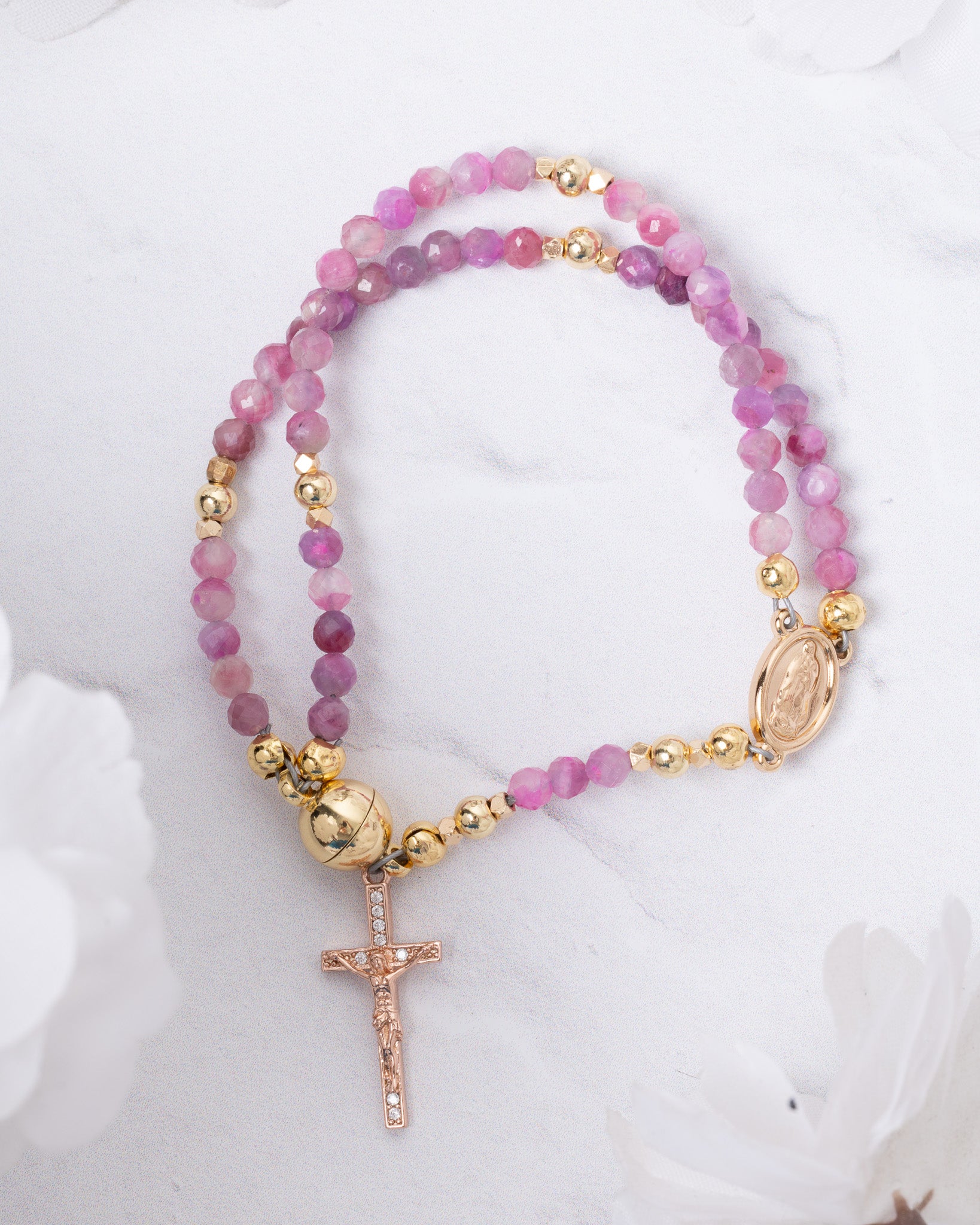 Delicate pink and gold Rosa Mystica magnetic rosary bracelet with rose-gold crucifix