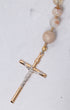 Desert Rose Guadalupe Rosary with gold crucifix and peach beads