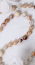 Desert Rose Guadalupe Rosary with amber and cream beaded necklace