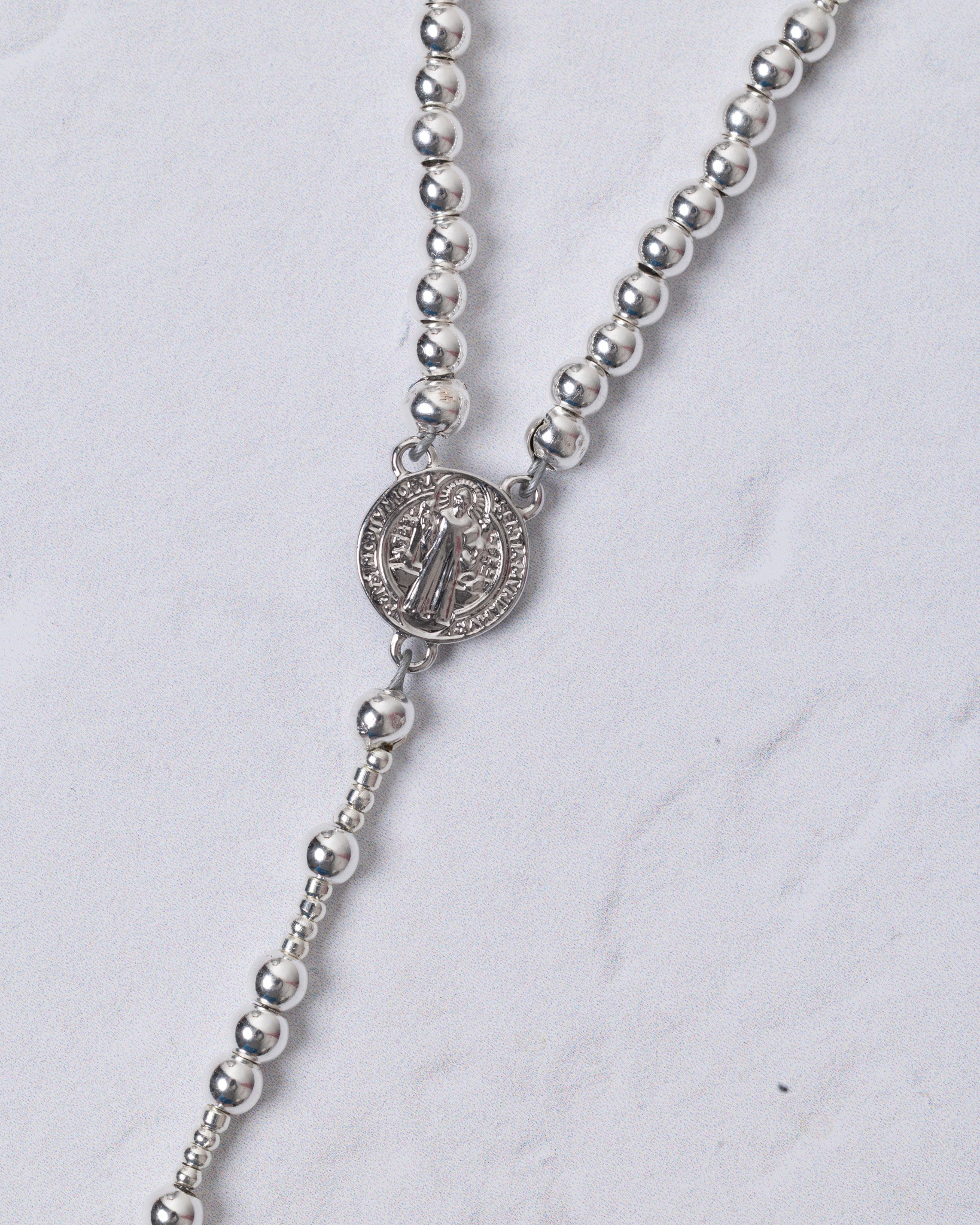 Mini white gold rosary with silver beaded necklace and saint benedict medal