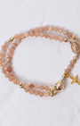 Sunstone magnetic rosary bracelet in delicate peach beads with gold accents