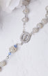 Delicate white gold rosary with sparkling Virgin Mary medallion