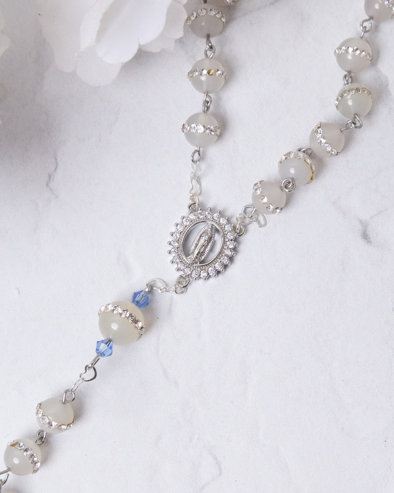 Delicate white gold rosary with sparkling Virgin Mary medallion