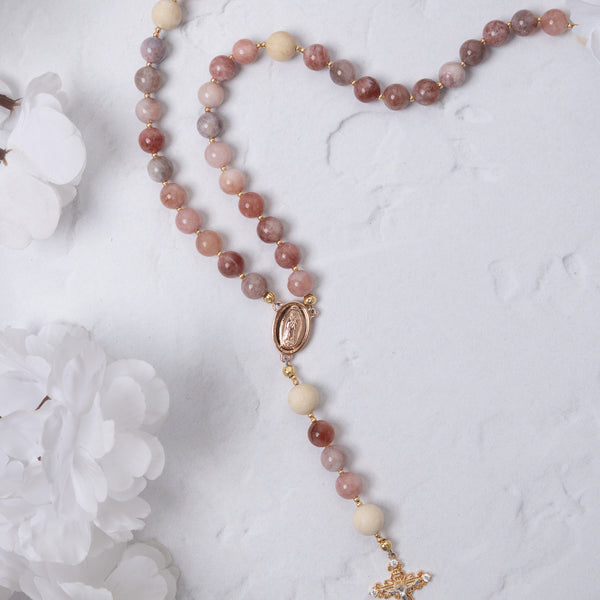 Rosa Mystica rosary with pink-white beads, gold Mary centerpiece, crucifix