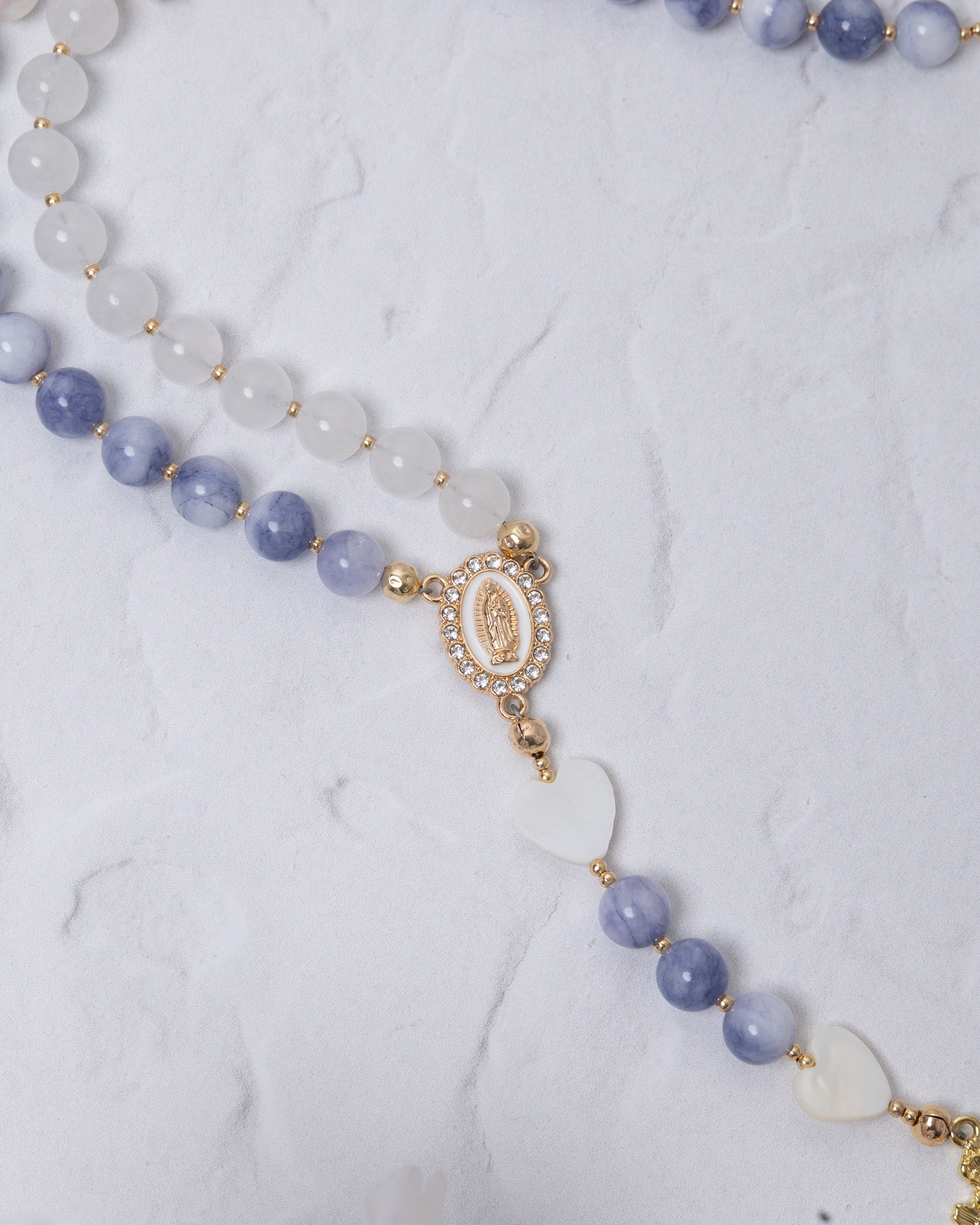 Delicate blue and white beaded Advent Candle Rosary with Our Lady of Guadalupe medallion