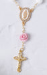 Delicate gold-toned Little Flower Car Decade Rosary with oval medallion and pink rose bead