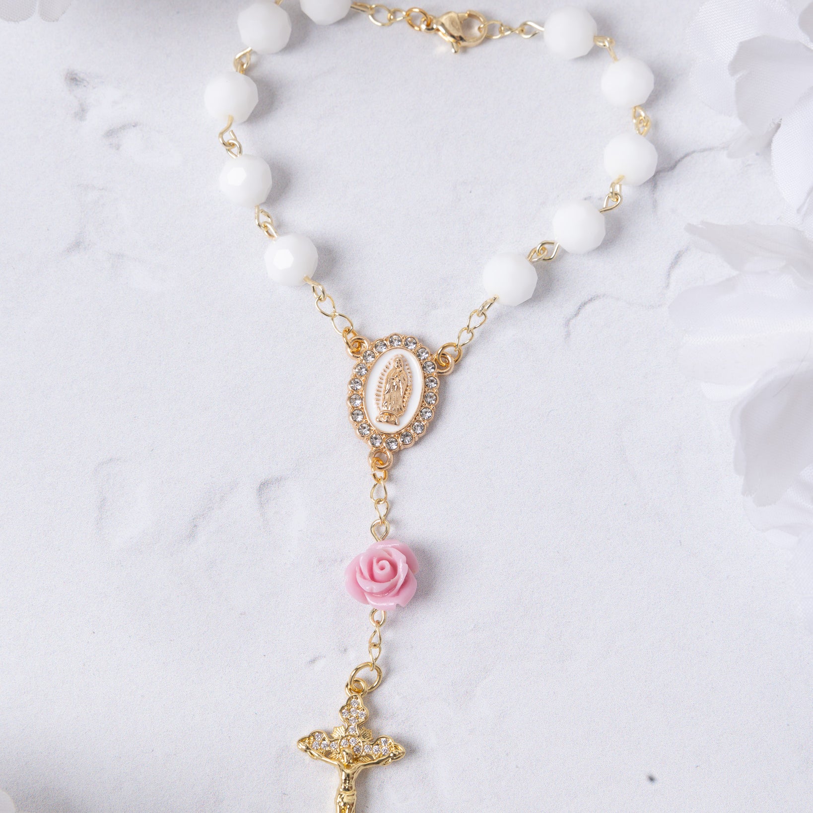 The Little Flower Car Decade Rosary with white beads, gold accents, pink rose charm