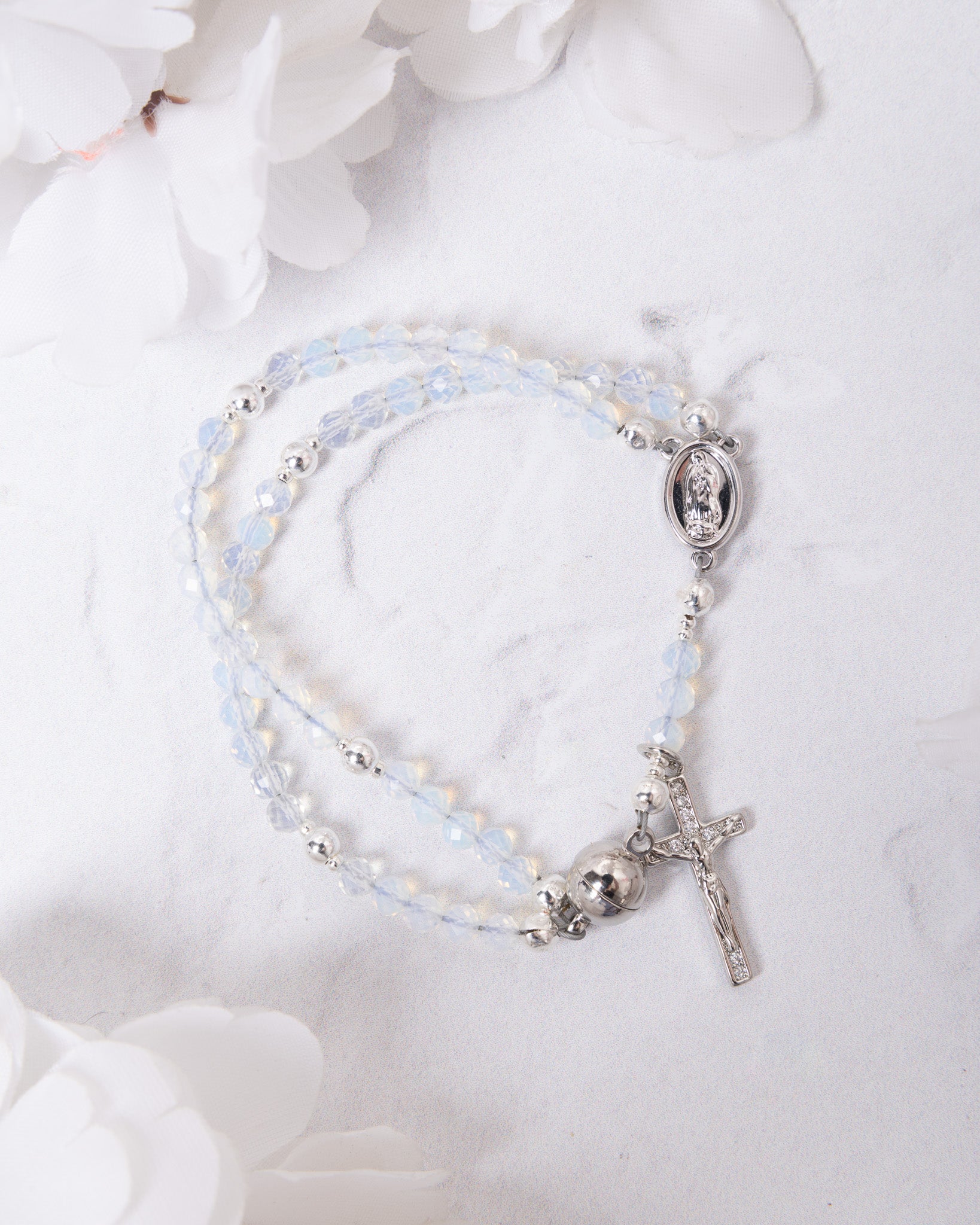 Delicate Opal Rosary Bracelet with blue crystal beads and silver charms