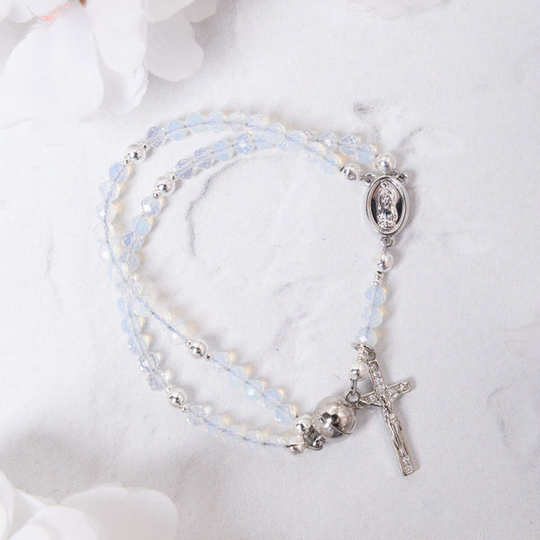 Delicate Opal Rosary Bracelet with blue crystal beads and silver charms