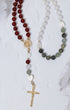 Lady of Guadalupe rosary with red beads and gold crucifix