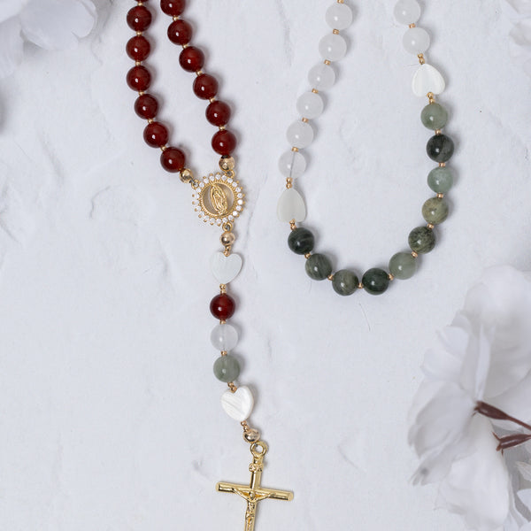 Lady of Guadalupe rosary with red beads and gold crucifix