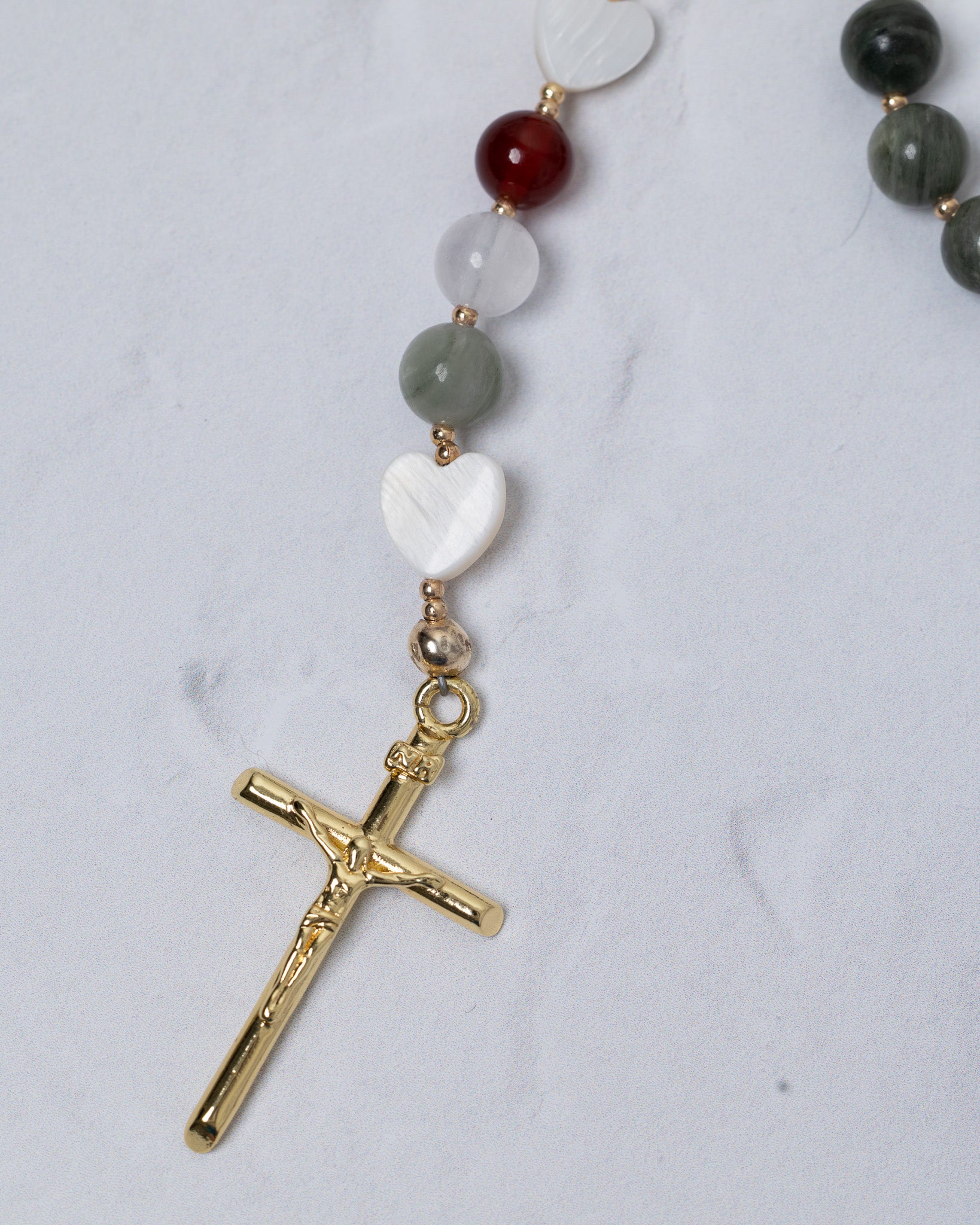 Lady of Guadalupe rosary with gold crucifix and multicolored beads