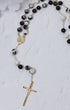 Black and white marbled stone rosary with gold chain, medallion, crucifix
