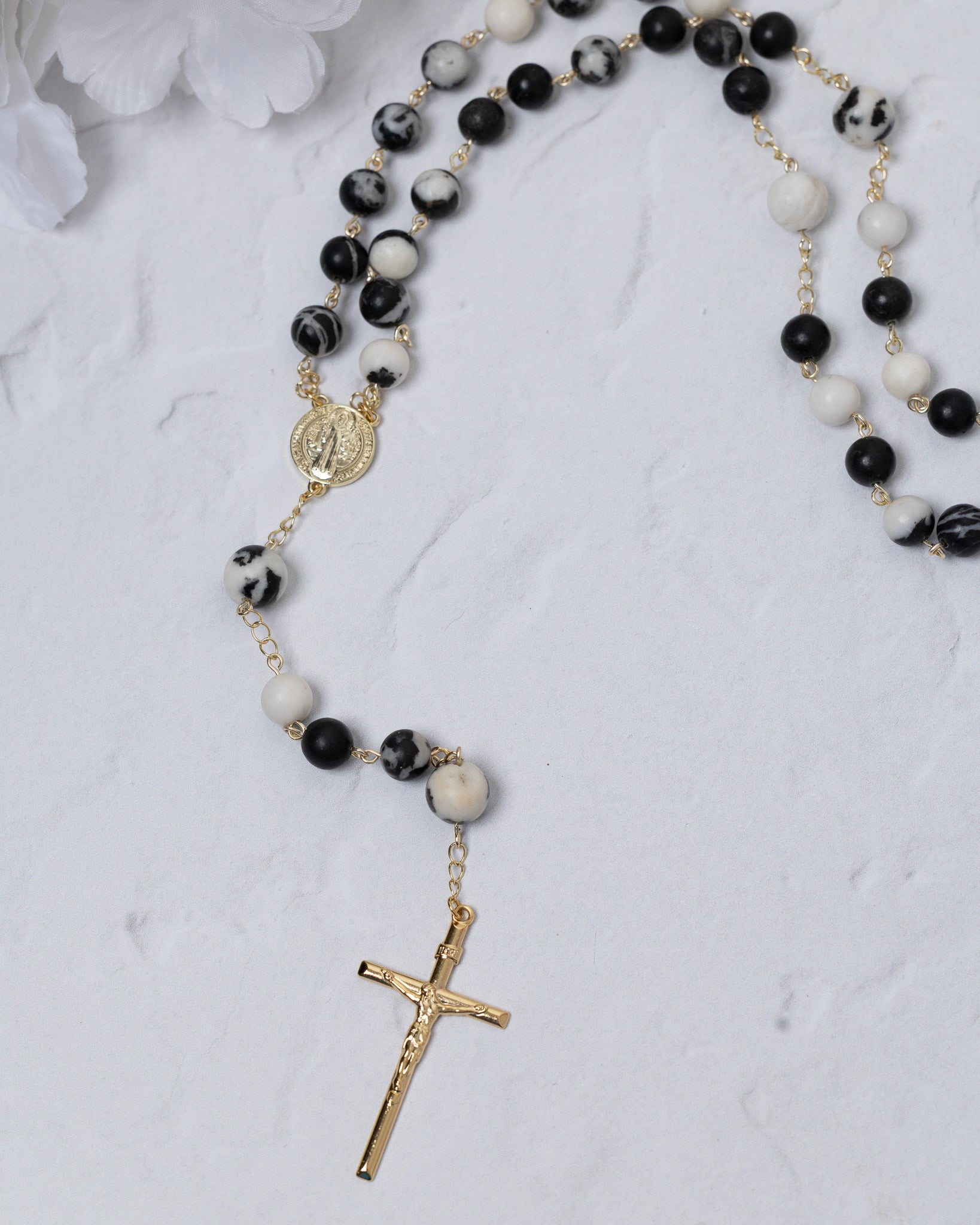 Black and white marbled stone rosary with gold chain, medallion, crucifix
