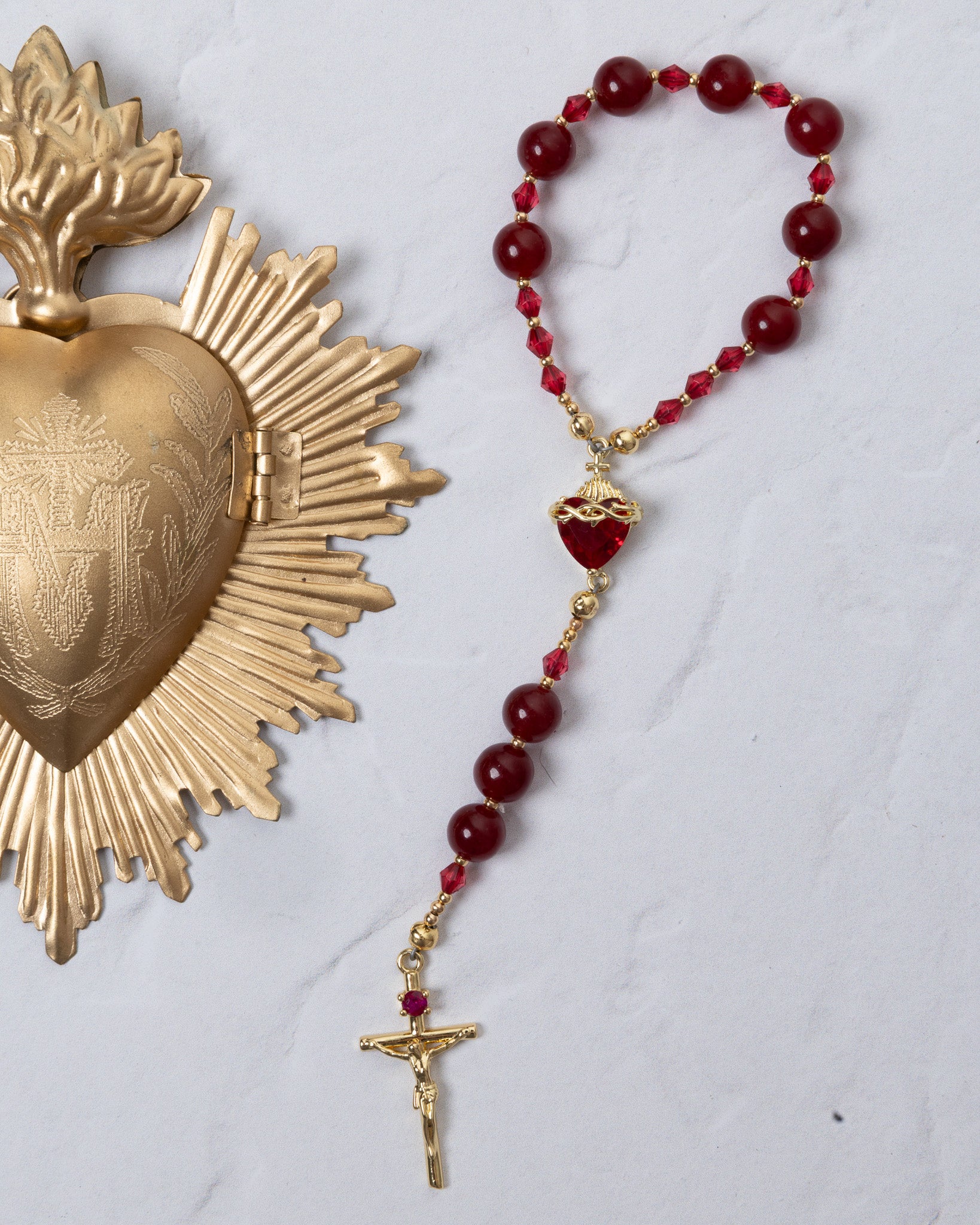Red beaded Seven Sorrows Chaplet with gold accents and heart centerpiece