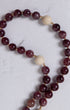 Lent Forty Days Rosary with deep purple gemstones and cream beads on gold spacers