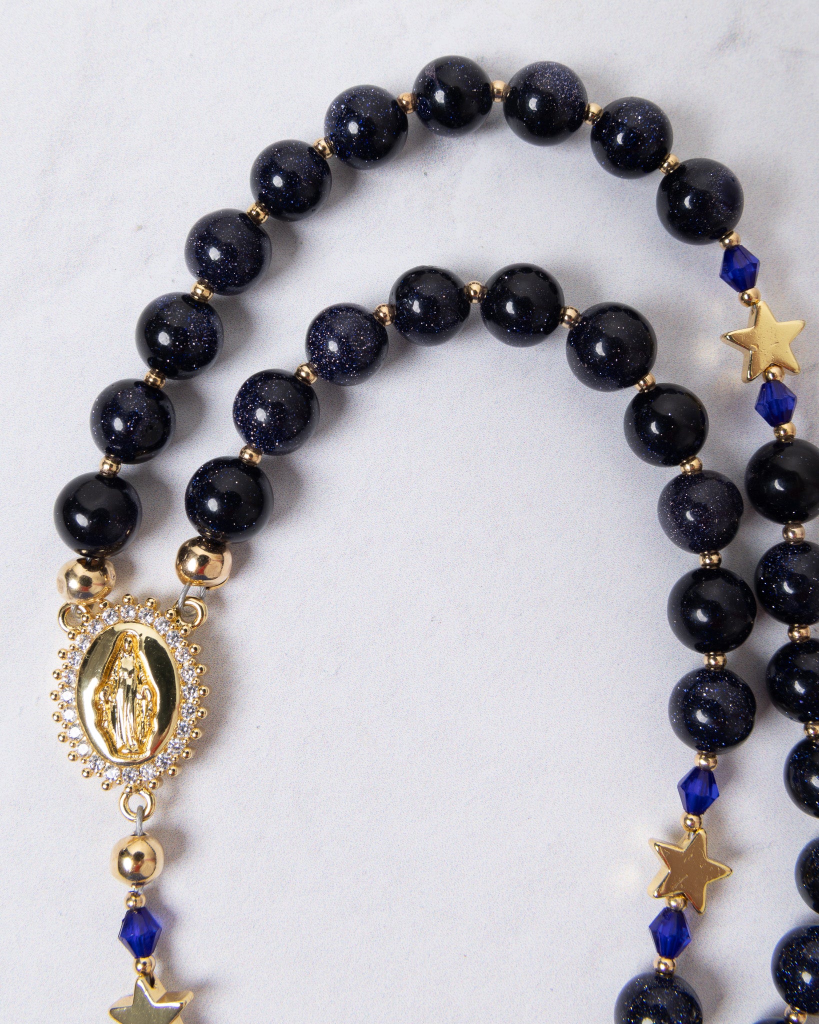 Black goldstone Our Lady of Aparecida rosary with Guadalupe medallion