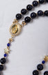 Our Lady of Aparecida navy blue and gold rosary with crystal medallion