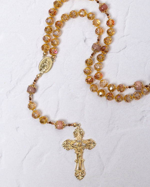 Gloria Dei Rosary with gold rosary, amber pink beads, ornate crucifix