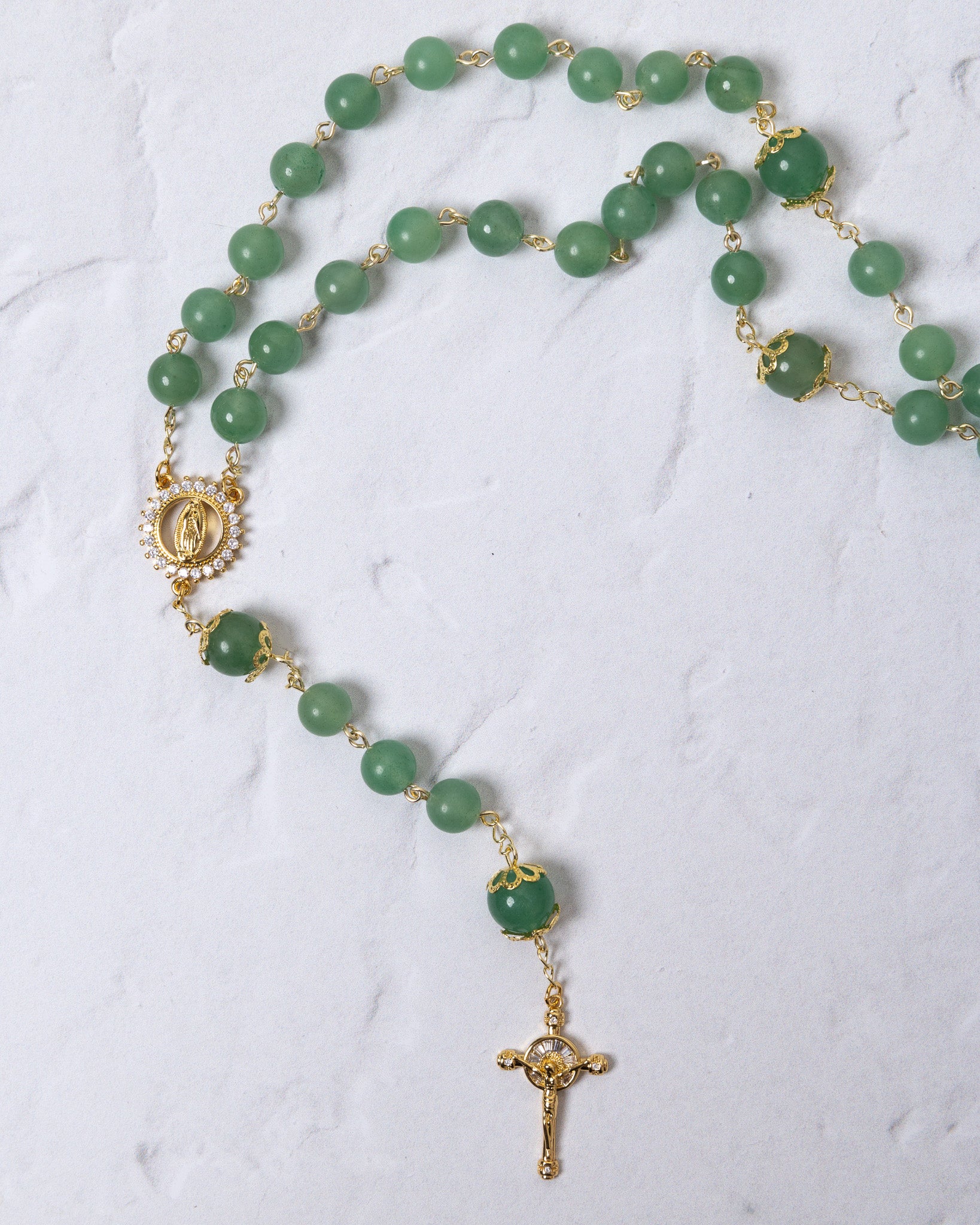 Green jadeite rosary with gold-toned accents and crucifix