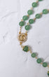 Jadeite rosary with green jade beads, gold accents, Virgin Mary medallion