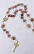 Mater Amoris rosary with rose-pink gemstone beads and gold crucifix
