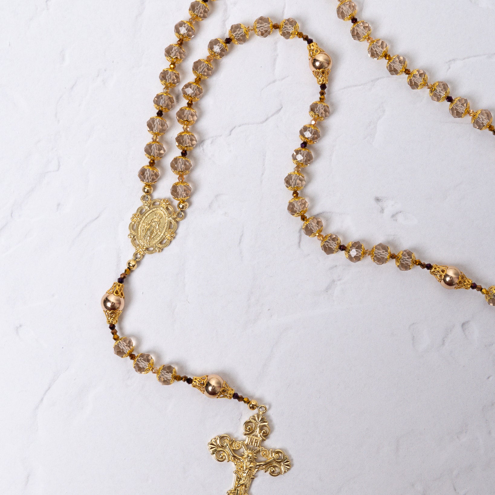 Gloria Aurea rosary with gold tone, crystal beads, crucifix pendant