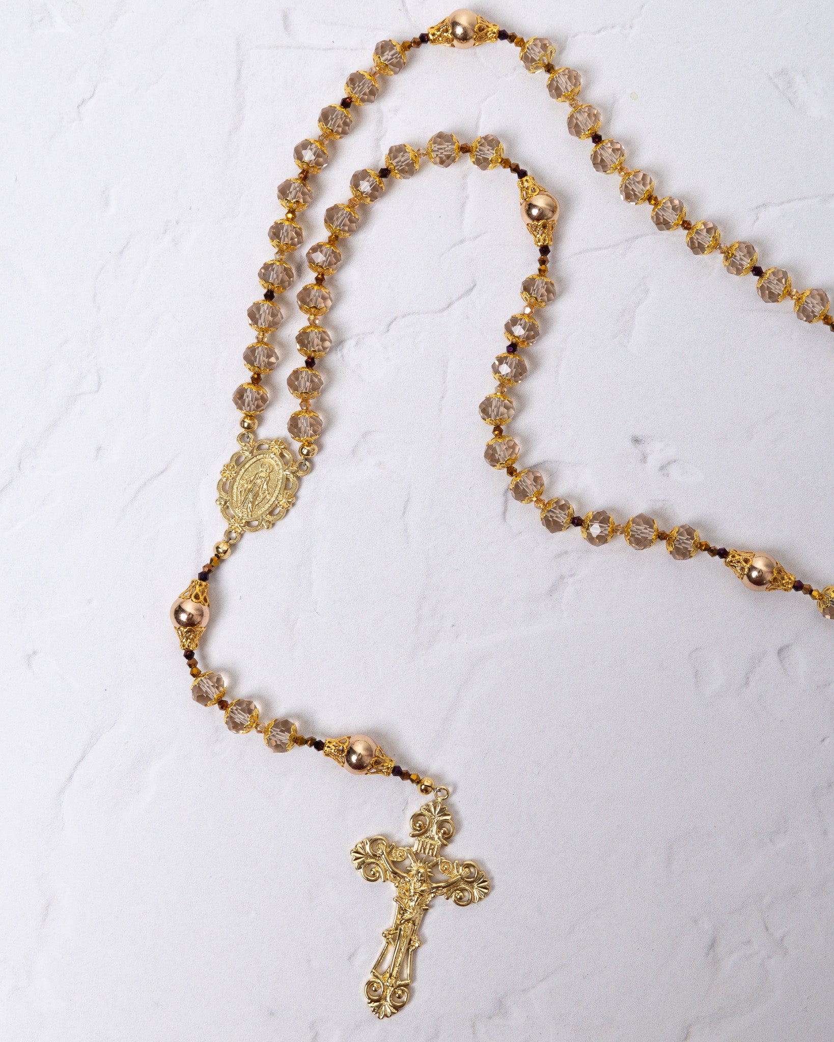 Gloria Aurea rosary with gold tone, crystal beads, crucifix pendant