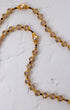 Gloria Aurea Rosary: elegant gold beaded necklace with smoke quartz