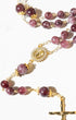 Delicate gold Advent Plum Rosary with purple garnet beads and engraved medallion