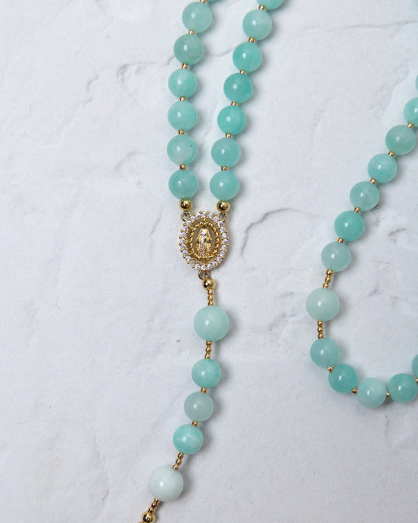 Hydrangea rosary featuring delicate turquoise amazonite beads and a gold toned our lady of guadalupe medallion with crystals