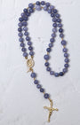 Wisteria bloom rosary featuring a delicate lavender jade bead with gold-toned metal accents and detailed crucifix