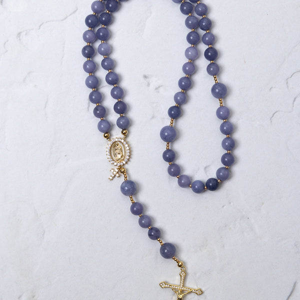Wisteria bloom rosary featuring a delicate lavender jade bead with gold-toned metal accents and detailed crucifix