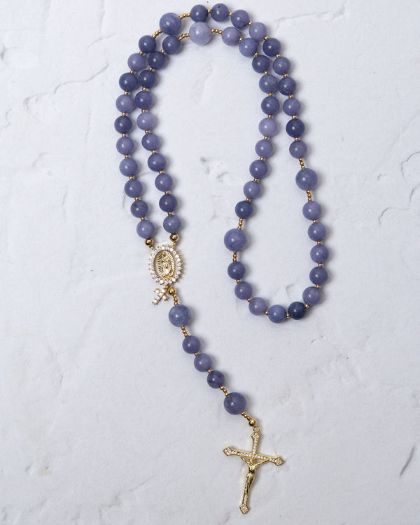 Wisteria bloom rosary featuring a delicate lavender jade bead with gold-toned metal accents and detailed crucifix