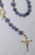 Wisteria Bloom rosary featuring delicate lavender jade beads with gold-toned accents and detailed crucifix