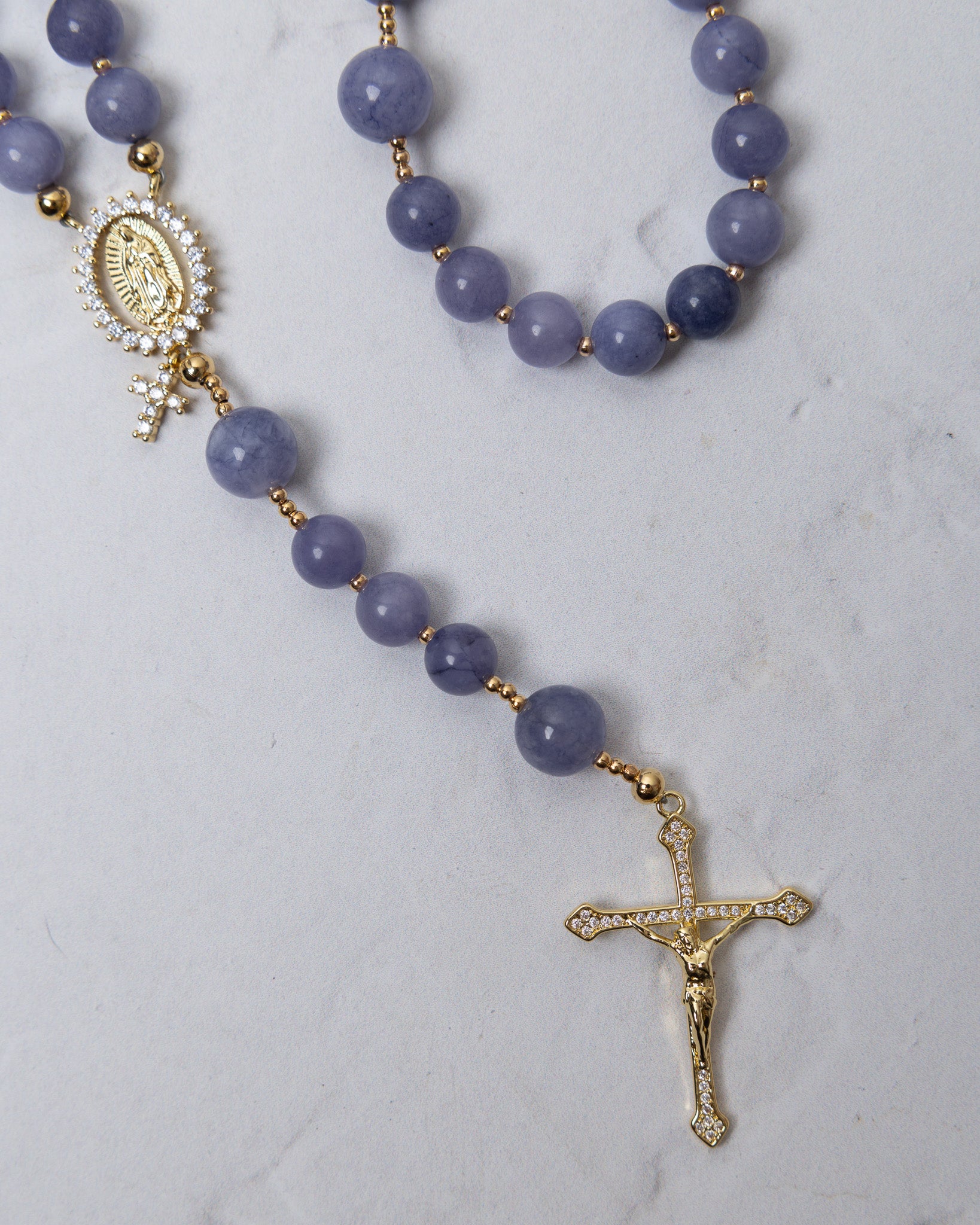 Wisteria Bloom rosary featuring delicate lavender jade beads with gold-toned accents and detailed crucifix